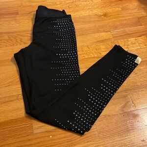 WOMEN’S Monreal leggings. Black with silver polka dots. Size S